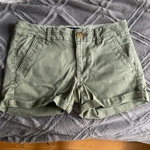 green colored american eagle shorts